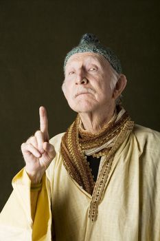 Portrait of wise guru with knit cap