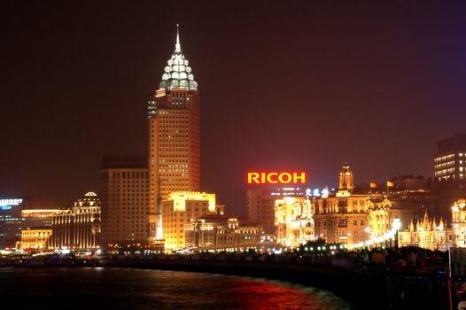 The night view of Shanghai Bund, where the commerical buildings are of vintage structure.