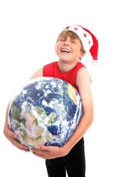 A happy boy hugging the earth globe, rejoices at the good news of Christmas.  Focus to globe