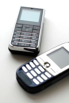 Two modern mobile phones side by side