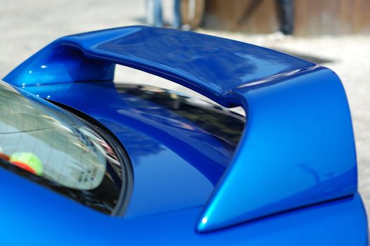 The rear part of a sportive car with detail