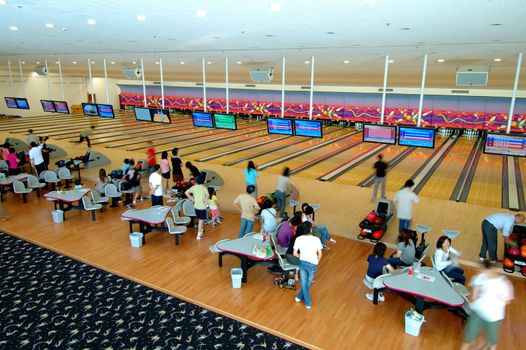 The bowling club full with people and players