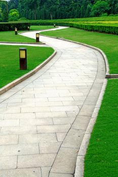 The curvy walk way of a city park