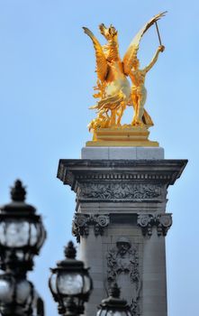Golden Pegasus on the top of the column of the bridge Alexander III