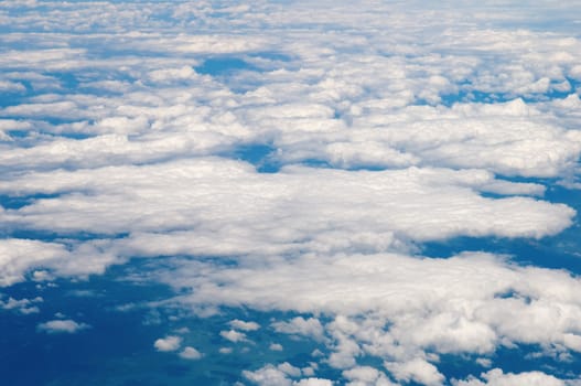 Blue sky with cotton like clouds