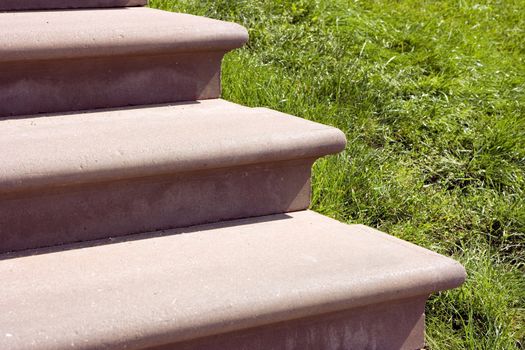 Photo of a ladder from a stone of conducting upwards