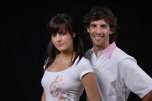 young fashion couple portrait in studio shot