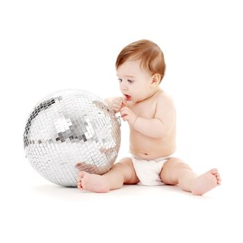 adorable baby boy with big glitterball over white