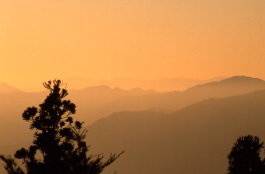 Gold sunlight fills sky over Hiroshima Japan.