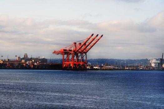 Port of Seattle v2 captures large container cranes located along the shores of Puget Sound at Seattle Washington. The skyline is set against a typical weather day for the region.

