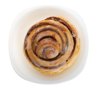 close-up cake with cinnamon, isolated on white