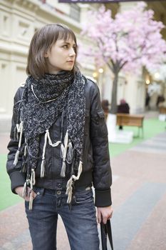 young attractive woman standing  in state department store. Moscow