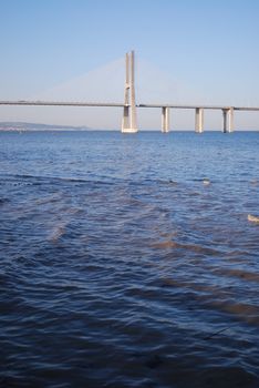 Vasco da Gama Bridge on vertical water view