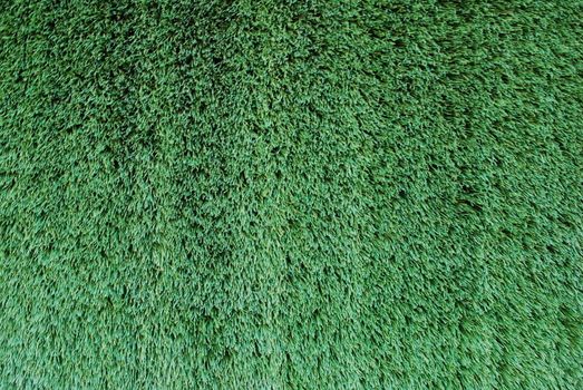 green grass background on a wall