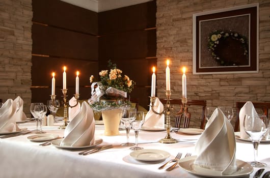 The served table with candles at restaurant