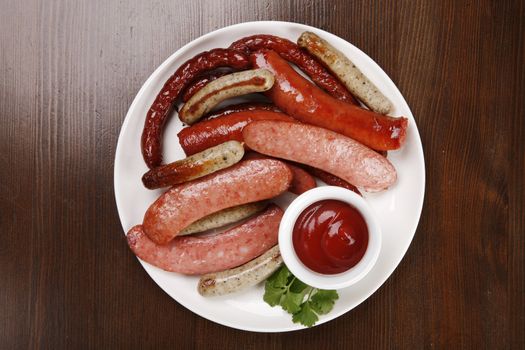 set of sausages on table with clipping path