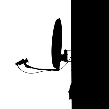 silhouette of satellite dish, black and white photo