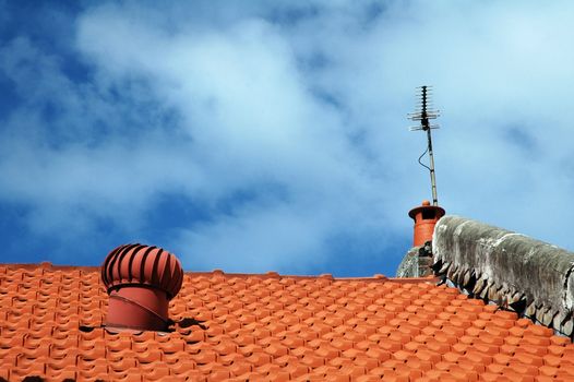 detail photo of typical australian house roof, orange tiles