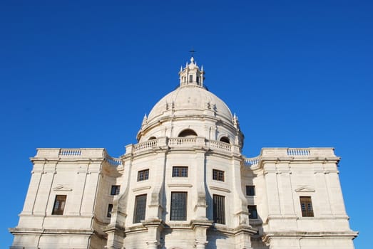 famous landmark/monument in Lisbon on blue sky background