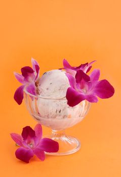 bowl of ice cream with natural eatable orchid