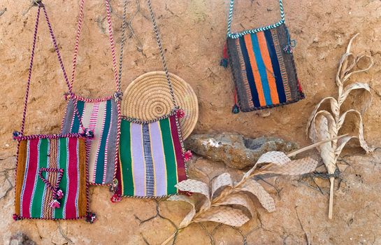 Ornamental striped bags on the wall