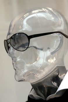 Transparent mannequin head with sunglasses
