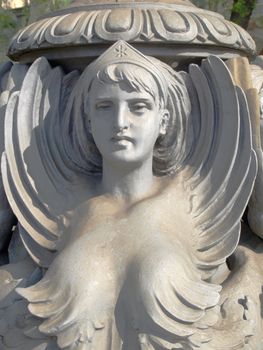 Detail of a statue of a mermaid