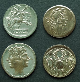 Ancient Roman coin on a black background