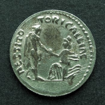 Ancient Roman coin on a black background