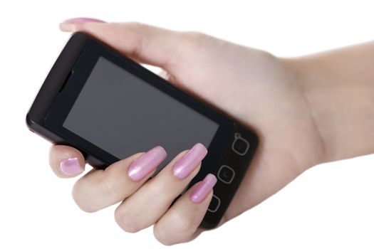 The female hand holds a mobile phone