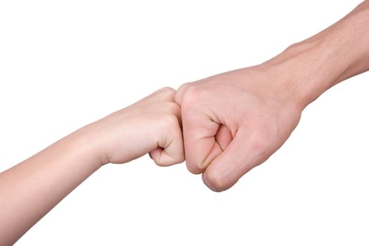 Two fists - children's and man's - on a white background