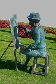 Bronze sculpture of the artist on the streets of the city.