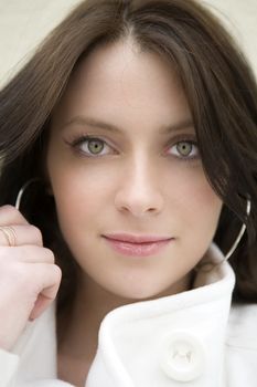 closeup portrait young woman with green eyes