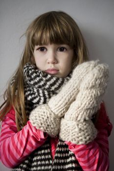 little cute upset  girl with scarf  have a flue