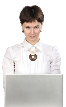 Portrait of young woman with laptop on white background