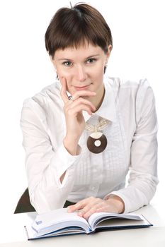 Young women with book on white background