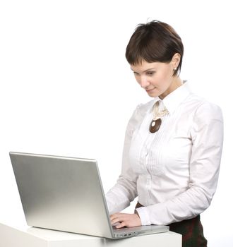 Portrait of young women with laptop on white background