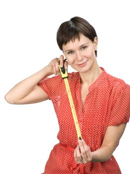 Young women with tape measure on white background