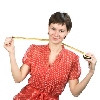 Young women with tape measure on white background