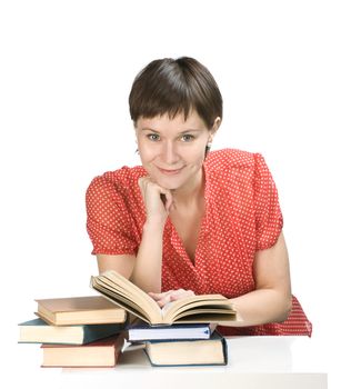 Young women with books on white background