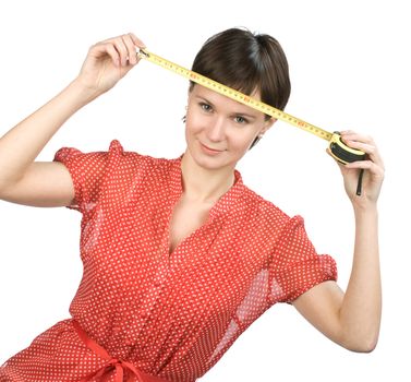 Young women with tape measure on white background
