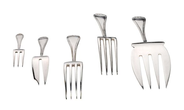 Silver forks set setout on a white background. With clipping path.
