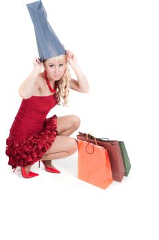 Happy woman with Christmas presents isolated on white