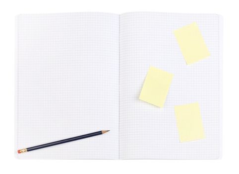 Blue pencil and yellow sticker on squared page. Pattern. Clipping path.