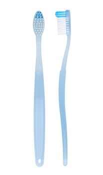 Macro shot of blue toothbrush. With clipping path.