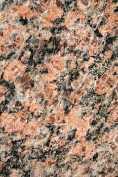 A close up of a granite wall.
