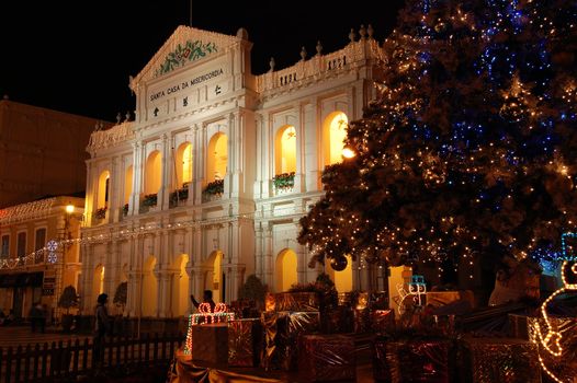 The santa casa de misericordia in the senado square in Macau, with Christmass tree