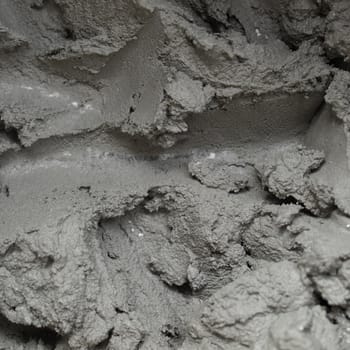 Detail of liquid concrete formed by mixed cement, water and sand