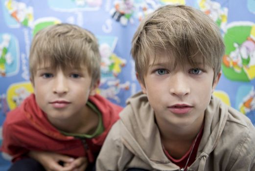 portrait happy cute twins brothers eight years old