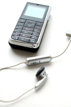 A modern mobile phone and the wired head-phone
